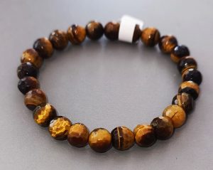Brățară cristale naturale Ochi de Tigru 8mm fațetat 21 Brățară cristale naturale Ochi de Tigru 8mm fațetat